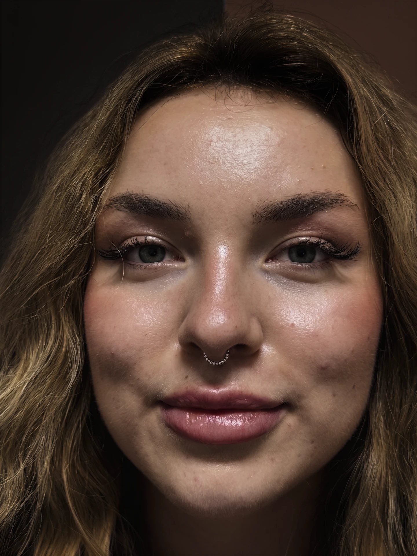 Septum piercing takı uygulaması